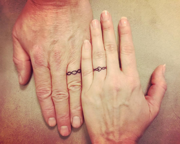 interlocking wedding ring tattoo design