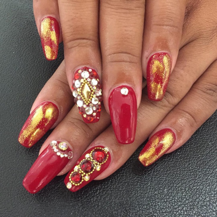 red and gold nail design