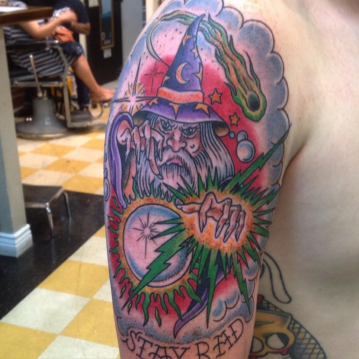 colorful wizard tattoo on sleeve