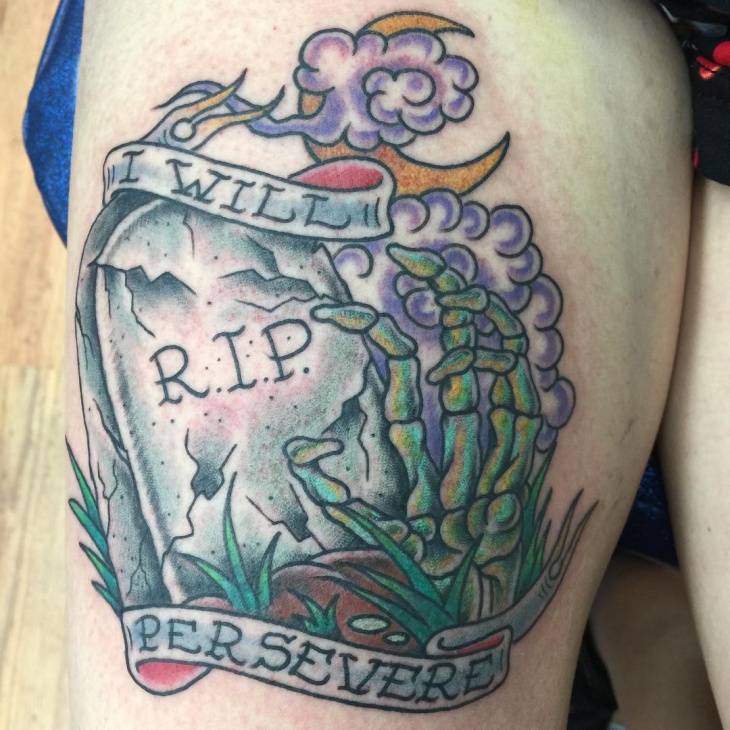 graveyard tattoo on thigh