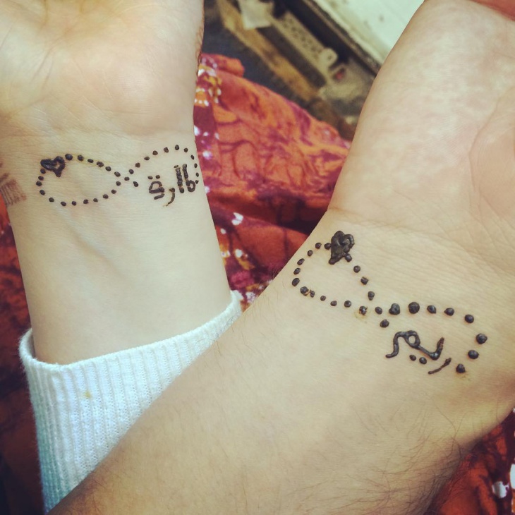 infinity henna tattoo design on wrist