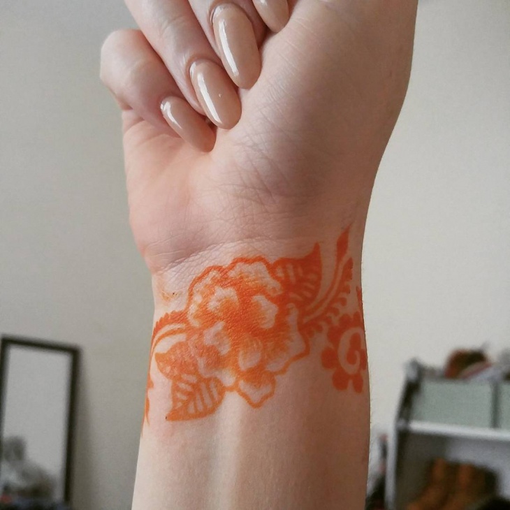 floral henna tattoo on wrist