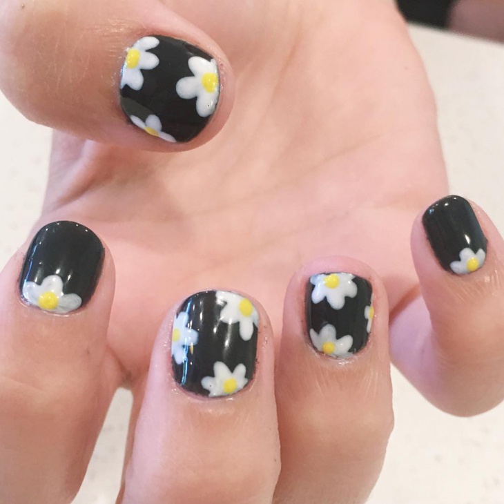 short black floral nail design