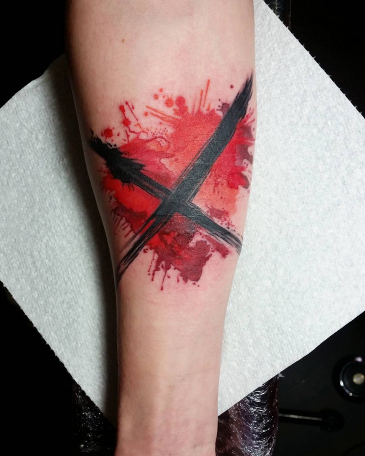 bleeding heart tattoo on forearm