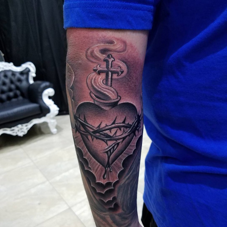 forearm sacred heart tattoo designs