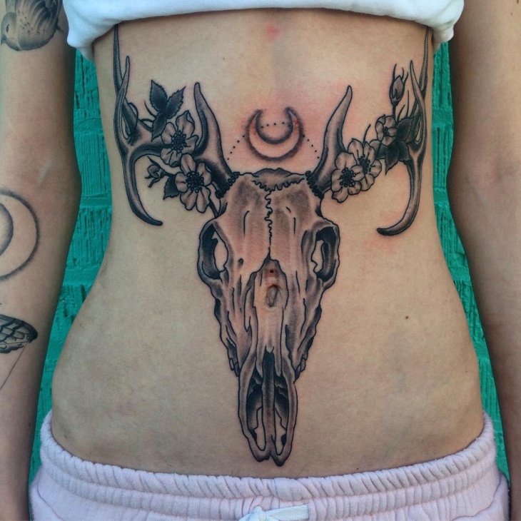deer skull stomach tattoo