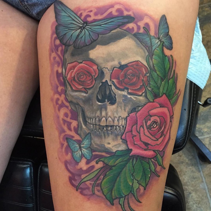 skull and butterfly tattoo for thigh