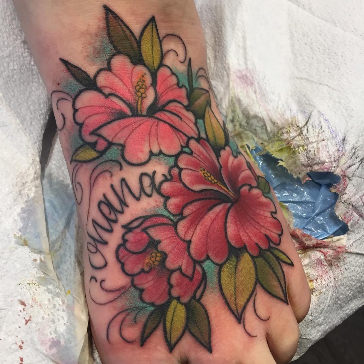 hawaiian flower tattoo design on foot