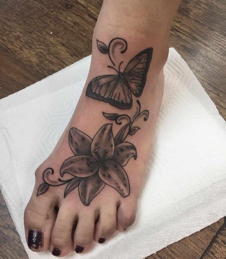 lily flower foot tattoo design