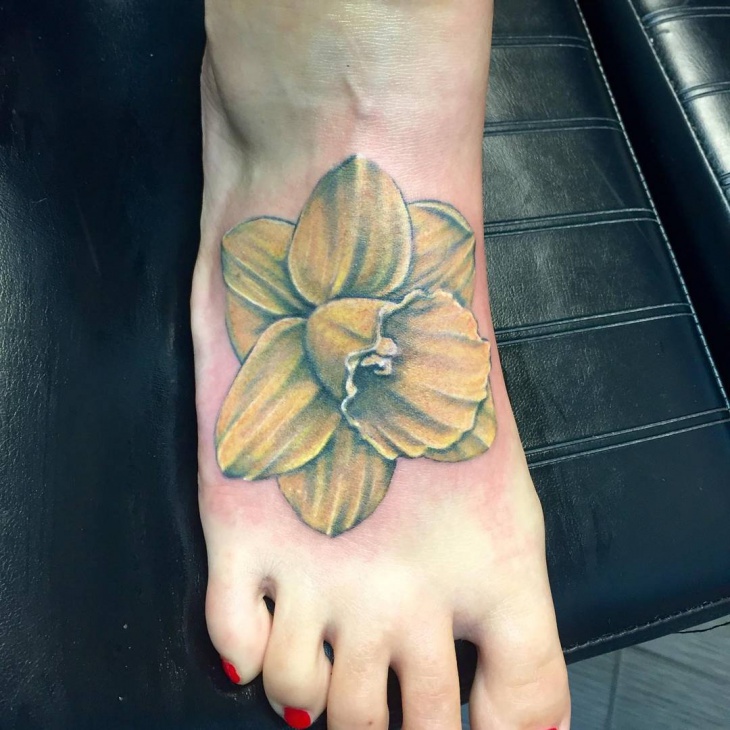 yellow flower foot tattoo design