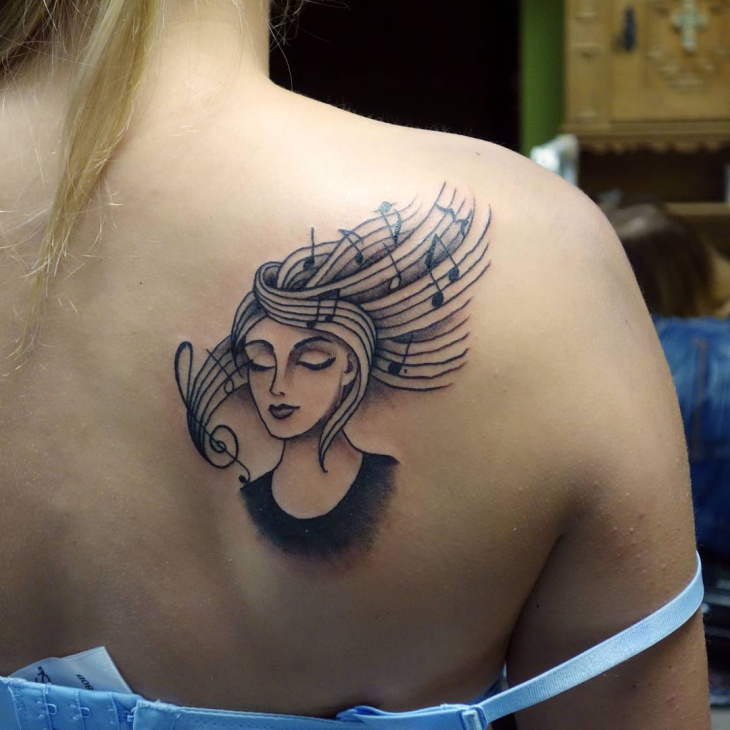 beautiful music tattoo design for women