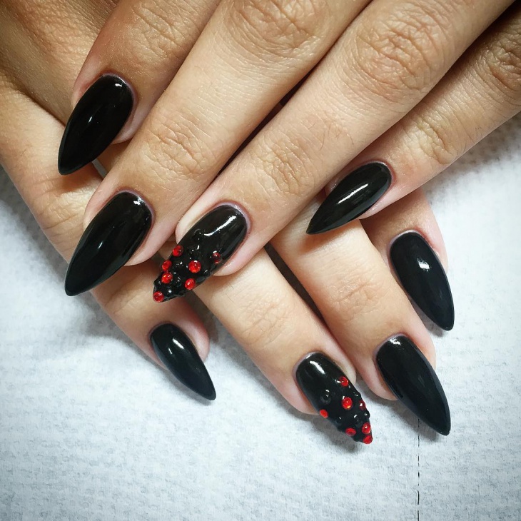 black and red pointy nail art
