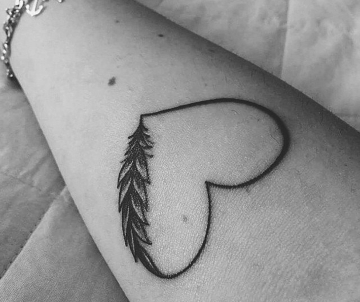 black and white heart feather tattoo