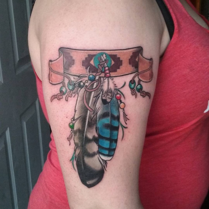 colorful feather armband tattoo