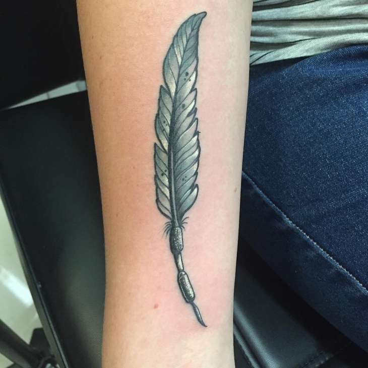 feather quill tattoo for forearm