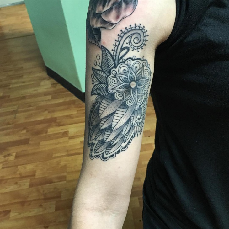 paisley feather sleeve tattoo