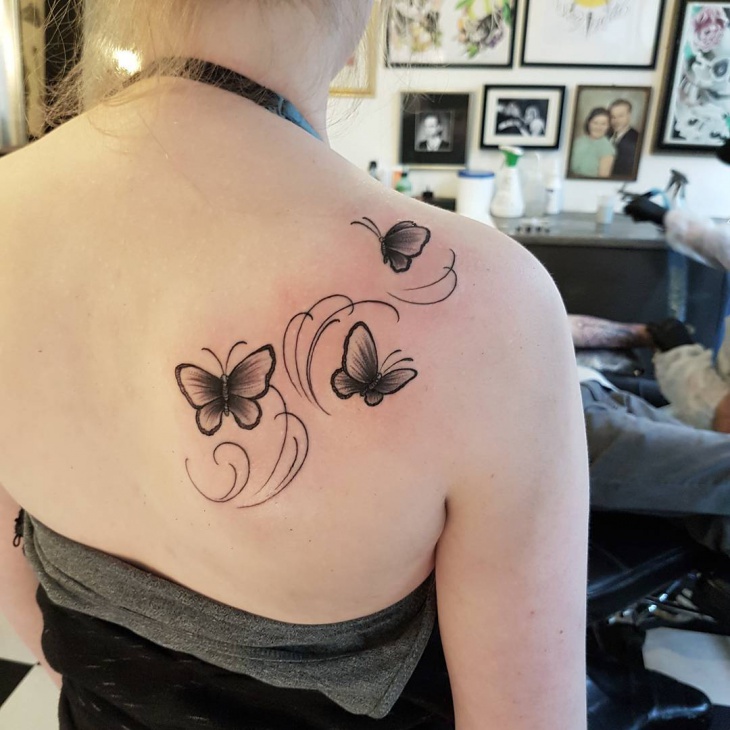 butterfly vine tattoo for women