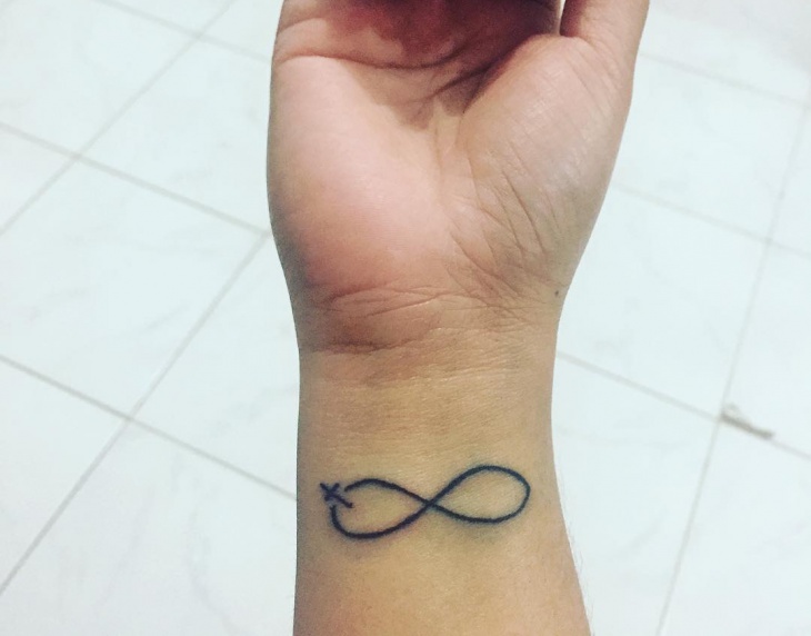 infinity cross wrist tattoo