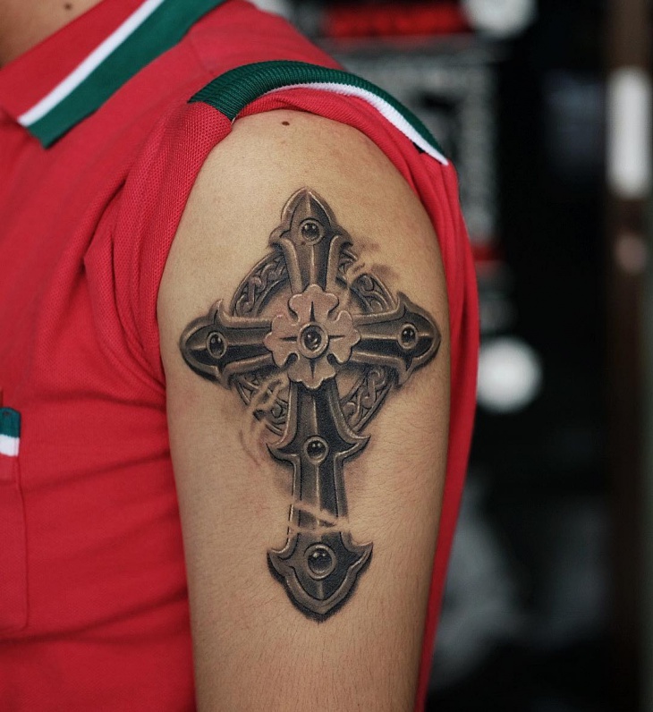 tribal cross sleeve tattoo