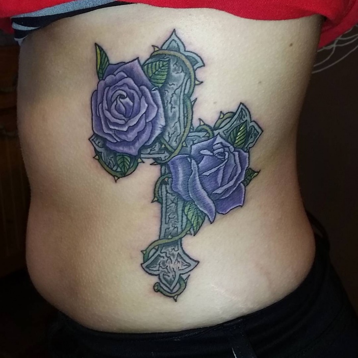 blue flower cross tattoo