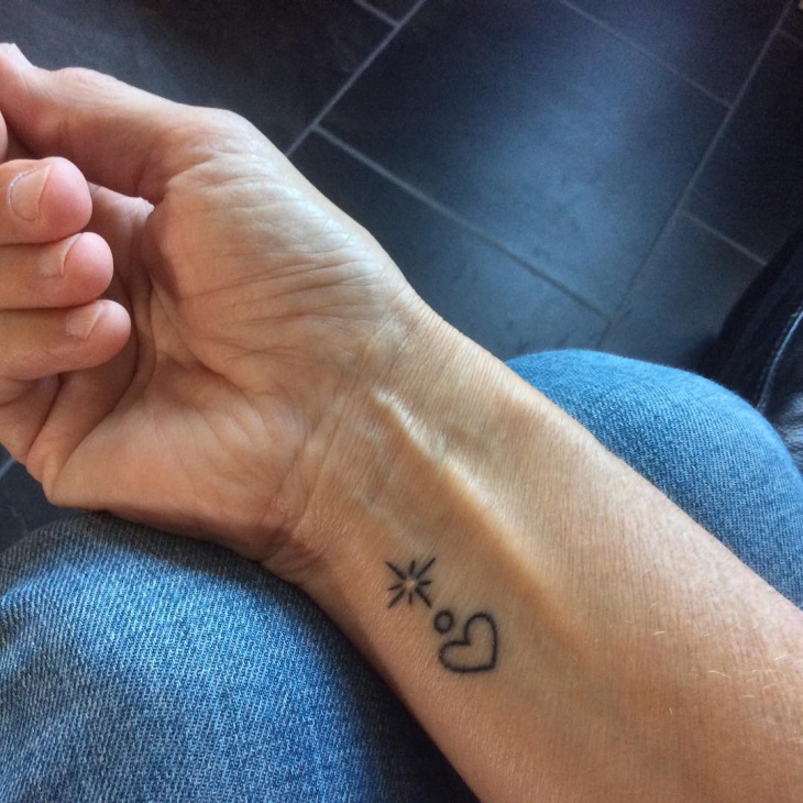 small love wrist tattoo