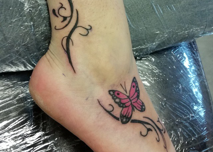 small butterfly tattoo on ankle