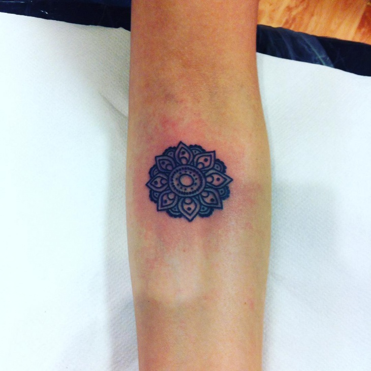 small flower mandala tattoo
