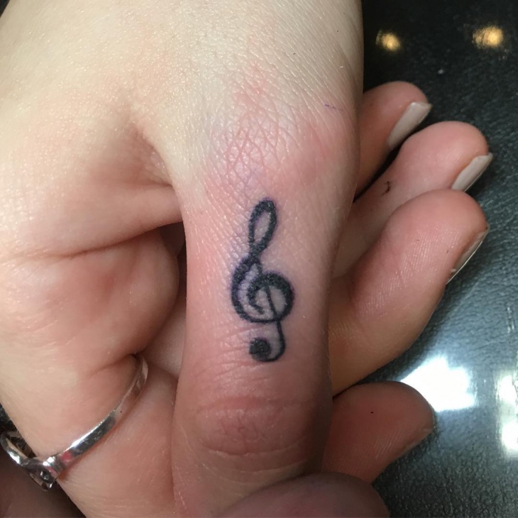 small music finger tattoo1