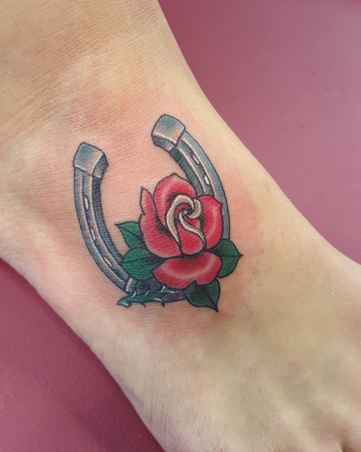 rose and horseshoe tattoo
