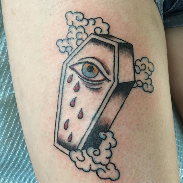creative eye and coffin tattoo