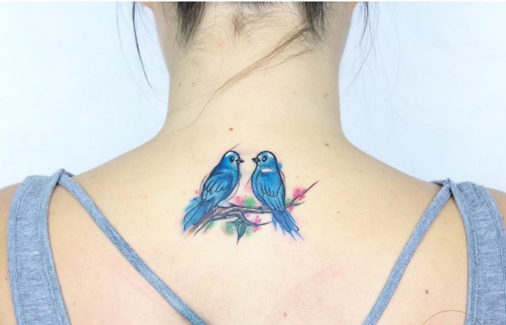 small watercolor tattoo for back