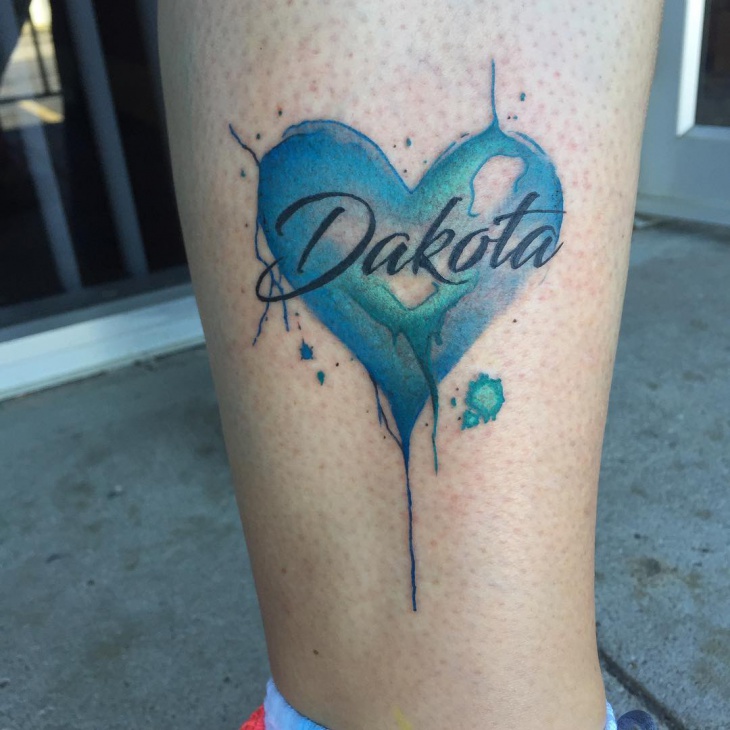 watercolor heart tattoo on leg