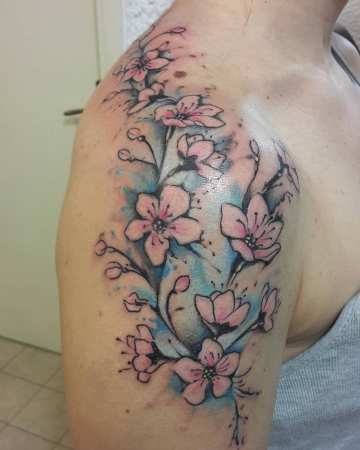 cherry blossom watercolor sleeve tattoo