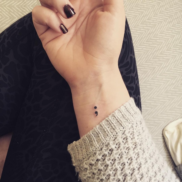 small semicolon wrist tattoo