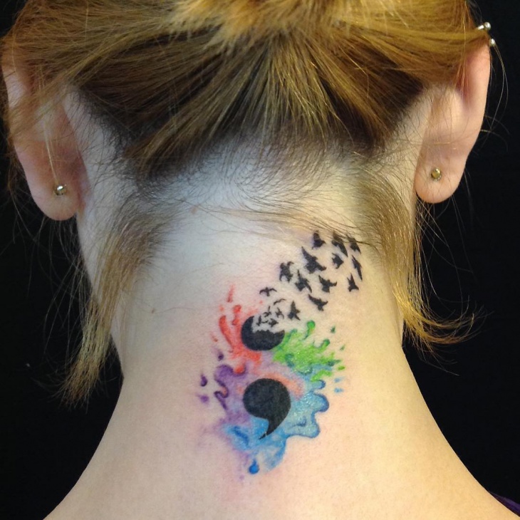flying bird semicolon tattoo