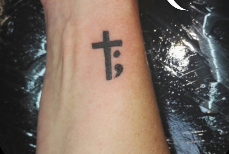 semicolon wrist tattoo with cross