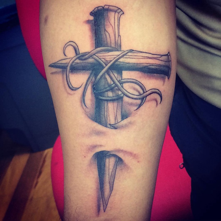 3d cross forearm tattoo