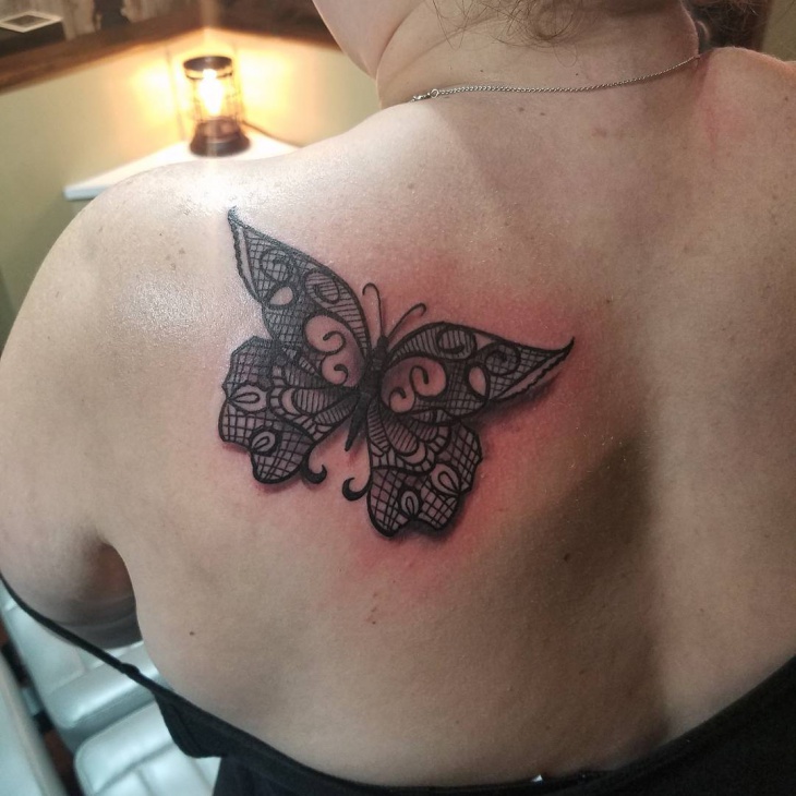 black lace butterfly tattoo for women
