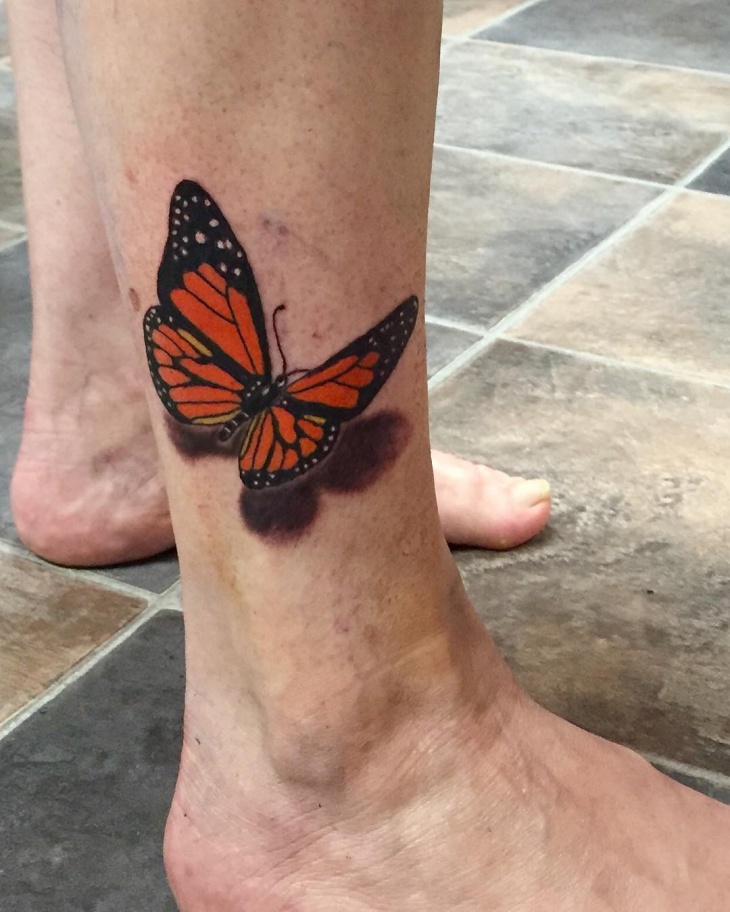flying monarch butterfly tattoo