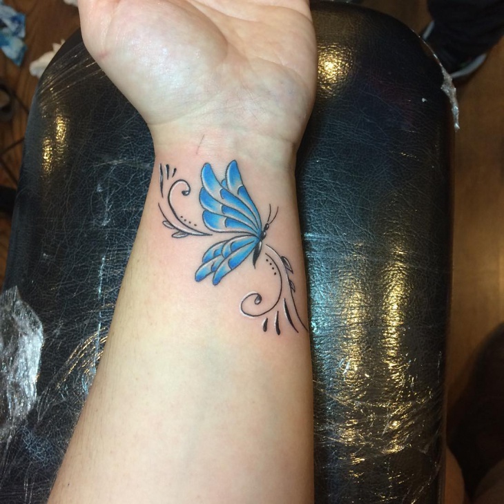side flying butterfly tattoo design