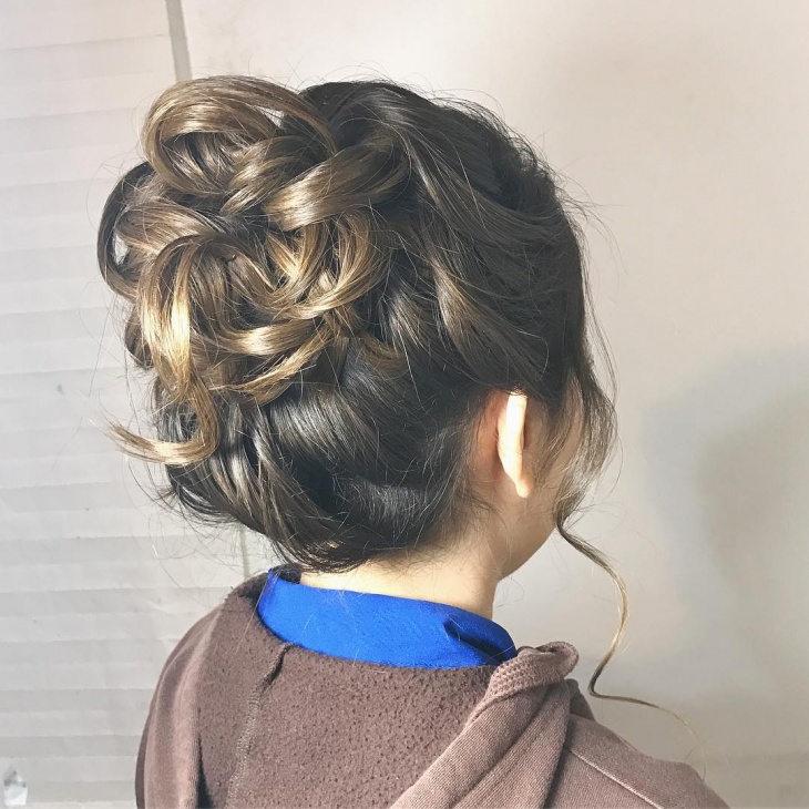 messy bun hairstyle for long hair
