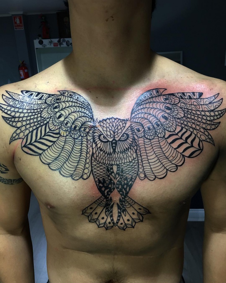 geometric owl chest tattoo