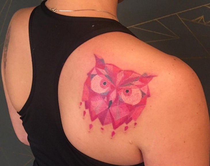 geometric owl tattoo on back1