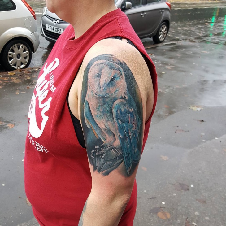mens owl arm tattoo