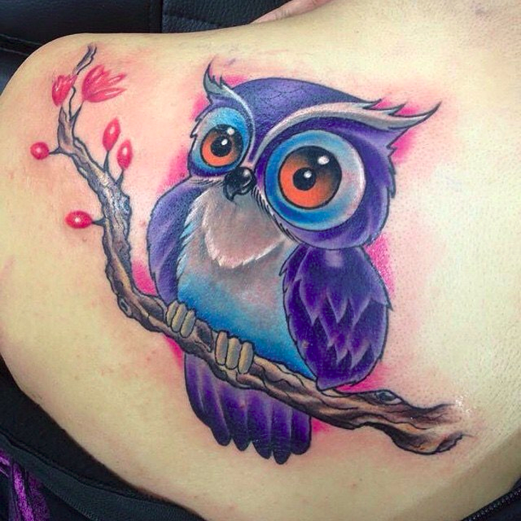 cartoon owl tattoo on back