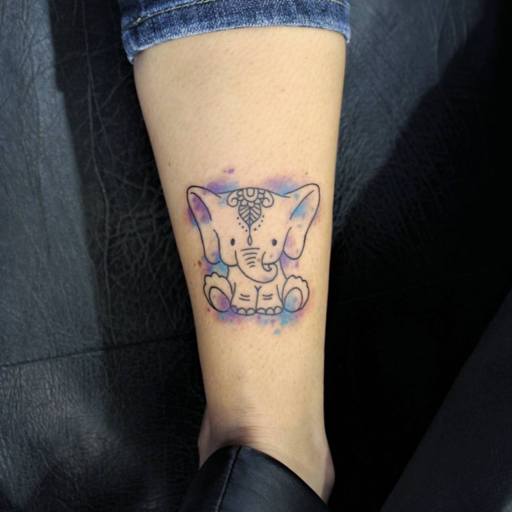 small elephant tattoo on leg for women