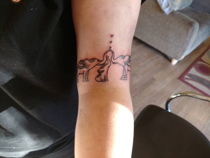 tribal elephant family tattoo