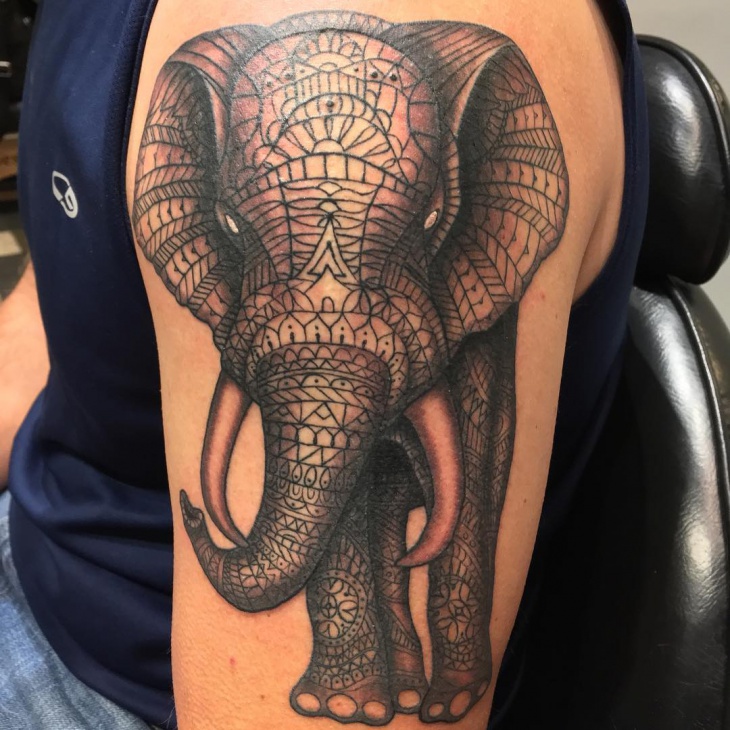 angry elephant tattoo on sleeve
