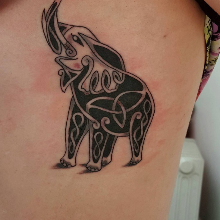 celtic elephant tattoo on hip