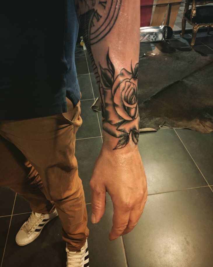 mens rose forearm tattoos